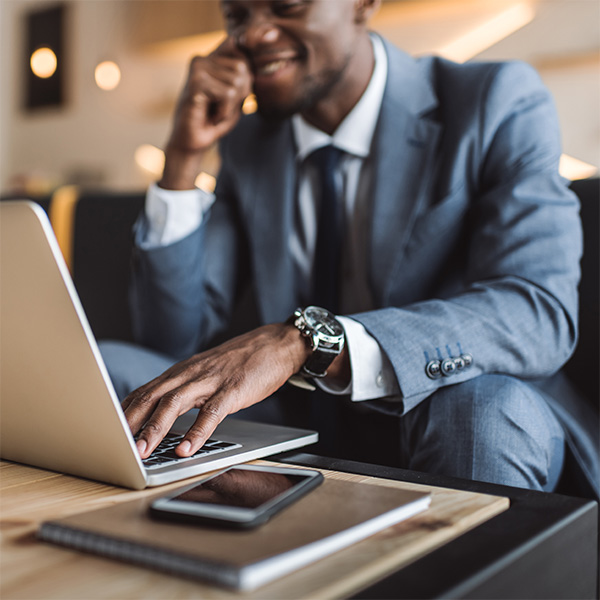 An agent working at a laptop